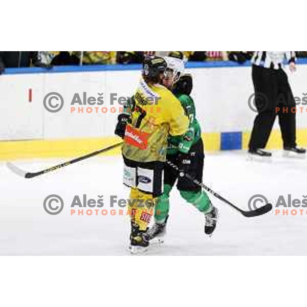 Christof Kromp and Zan Jezovsek of SZ Olimpija in action during IceHL match between SZ Olimpija and Vienna Capitals in Ljubljana, Slovenia on January 21, 2022