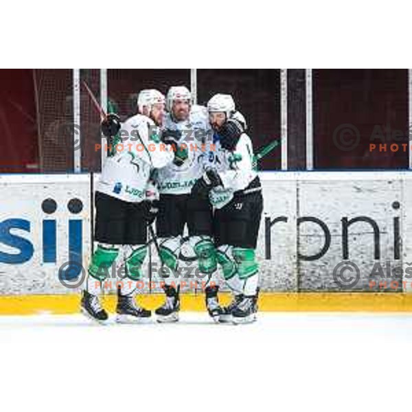 Miha Zajc, Anze Ropret and Sebastien Piche celebrate goal at semi-final of Slovenian ice-hockey league match between HDD Sij Acroni Jesenice and SZ Olimpija at Jesenice, Slovenia on January 25, 2021