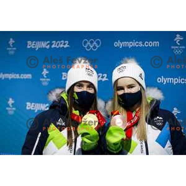 Ursa Bogataj of Slovenia Women’s Ski jumping Olympic team with Gold Olympic medal and Nika Kriznar with bronze Olympic medal in Zhangjiakou, Beijing 2022 Winter Olympic Games, China on February 6, 2022
