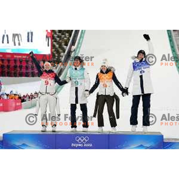 Nika Kriznar, Timi Zajc, Ursa Bogataj and Peter Prevc of Slovenia Ski jumping Olympic team, gold medal winners at Mix Team Competition in Zhangjiakou venue of Beijing 2022 Winter Olympic Games, China on February 7, 2022