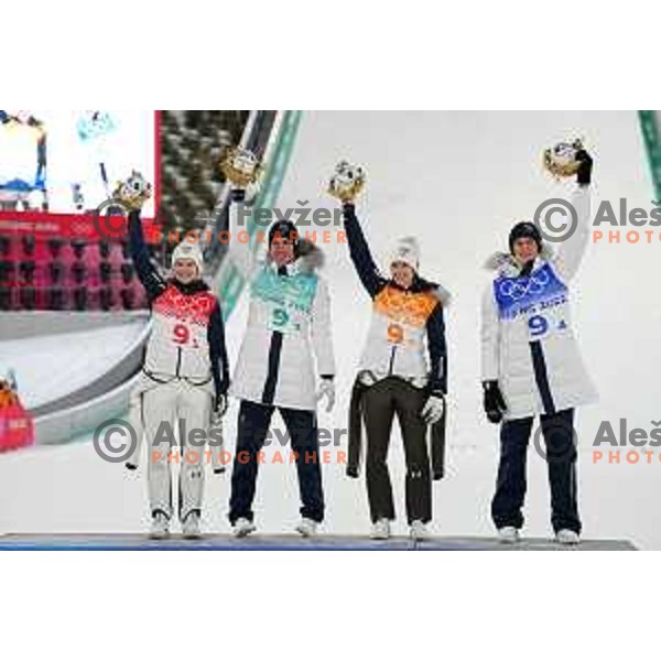 Nika Kriznar, Timi Zajc, Ursa Bogataj and Peter Prevc of Slovenia Ski jumping Olympic team, gold medal winners at Mix Team Competition in Zhangjiakou venue of Beijing 2022 Winter Olympic Games, China on February 7, 2022
