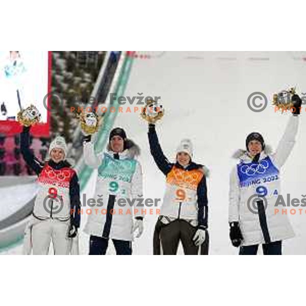 Nika Kriznar, Timi Zajc, Ursa Bogataj and Peter Prevc of Slovenia Ski jumping Olympic team, gold medal winners at Mix Team Competition in Zhangjiakou venue of Beijing 2022 Winter Olympic Games, China on February 7, 2022