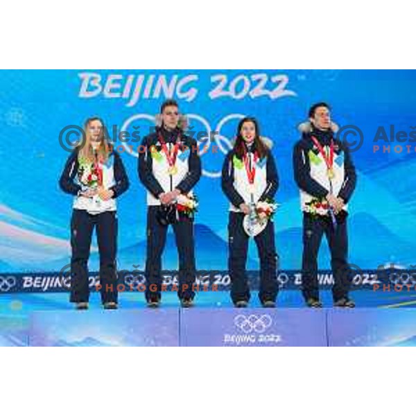 Nika Kriznar, Timi Zajc, Ursa Bogataj and Peter Prevc of Slovenia Ski jumping Olympic team, gold medal winners at Mix Team Competition in Zhangjiakou venue of Beijing 2022 Winter Olympic Games, China on February 7, 2022