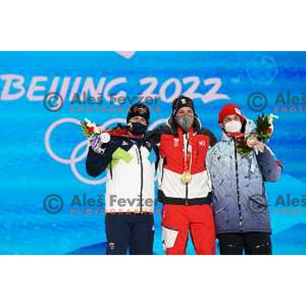 Tim Mastnak of Slovenia, Olympic Silver medalist, Benjamin Karl (AUT) gold medalist and Vic Wild (ROC) bronze medalsit in Snowboard Parallel Giant Slalom in Zhangjiakou Genting Snow Park, Beijing 2022 Winter Olympic Games, China on February 8, 2022