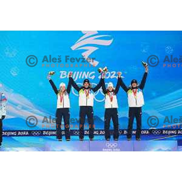 Nika Kriznar, Timi Zajc, Ursa Bogataj and Peter Prevc of Slovenia Ski jumping Olympic team, gold medal winners at Mix Team Competition in Zhangjiakou venue of Beijing 2022 Winter Olympic Games, China on February 7, 2022