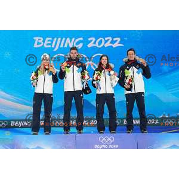 Nika Kriznar, Timi Zajc, Ursa Bogataj and Peter Prevc of Slovenia Ski jumping Olympic team, gold medal winners at Mix Team Competition in Zhangjiakou venue of Beijing 2022 Winter Olympic Games, China on February 7, 2022