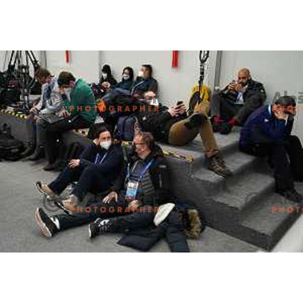 Journalists working in press centre during weather delay at Men\'s Giant slalom in Yanging National Alpine Centre, Beijing 2022 Winter Olympic Games, China on February 13, 2022