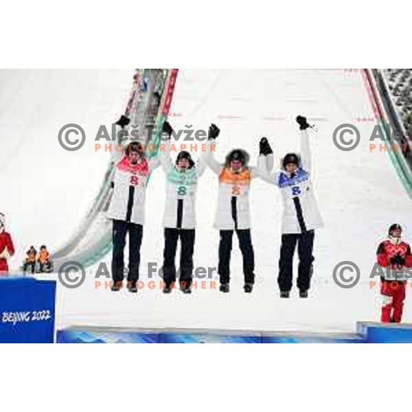 Lovro Kos, Cene Prevc, Timi Zajc, Peter Prevc of Slovenia celebrate silver medal at Ski Jumping Men’s Team Competition in Zhangjiakou venue of Beijing 2022 Winter Olympic Games, China on February 14, 2022