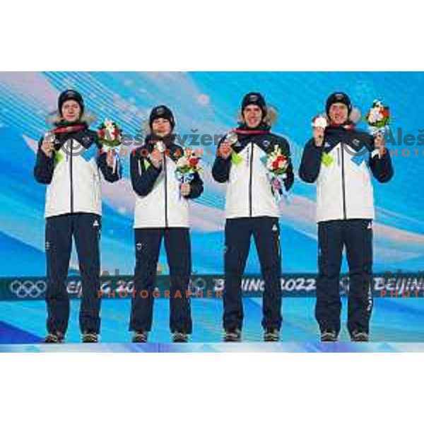 Lovro Kos, Cene Prevc, Timi Zajc, Peter Prevc of Slovenia celebrate silver medal in Ski Jumping Men’s Team Competition in Medal Plaza, Zhangjiakou venue of Beijing 2022 Winter Olympic Games, China on February 15, 2022