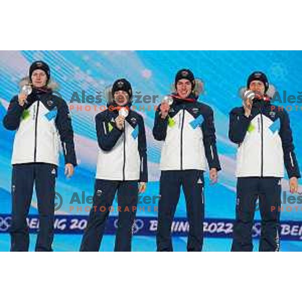 Lovro Kos, Cene Prevc, Timi Zajc, Peter Prevc of Slovenia celebrate silver medal in Ski Jumping Men’s Team Competition in Medal Plaza, Zhangjiakou venue of Beijing 2022 Winter Olympic Games, China on February 15, 2022