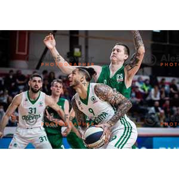 Zach Auguste and Jurij Macura in action during semi-final of Spar Cup basketball match between Cedevita Olimpija and Krka in Kodeljevo Hall, Ljubljana, Slovenia on February 17, 2022