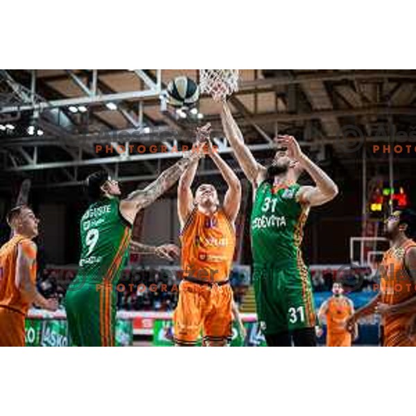 Zackary Elias Auguste and Marko Radovanovic vs Bine Prepelic in action during Spar Cup finals basketball match between Cedevita Olimpija and Helios Suns in Kodeljevo, Ljubljana, Slovenia on February 18, 2022. Photo: Jure Banfi/www.alesfevzer.com