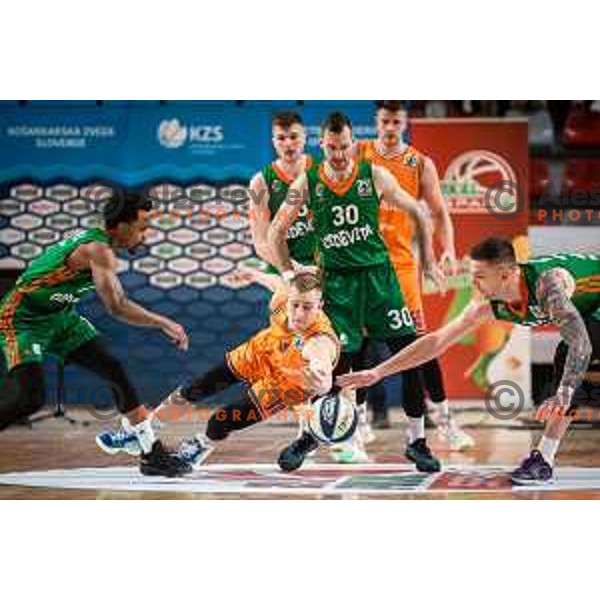 Urban Oman vs Zoran Dragic and Alen Omic in action during Spar Cup finals basketball match between Cedevita Olimpija and Helios Suns in Kodeljevo, Ljubljana, Slovenia on February 18, 2022. Photo: Jure Banfi/www.alesfevzer.com
