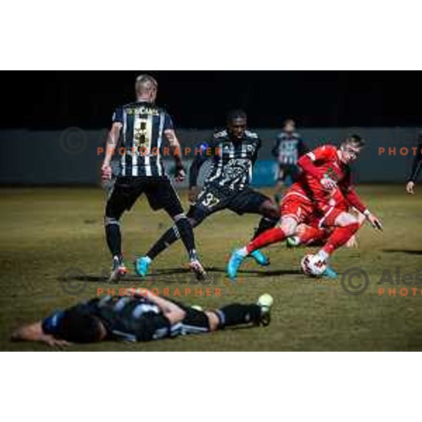 Samsindin Ouro vs Nik Marinsek in action during Prva liga Telemach football match between Aluminij and Mura in Sportni park Kidricevo, Slovenia, on February 19, 2022. Photo: Jure Banfi/www.alesfevzer.com
