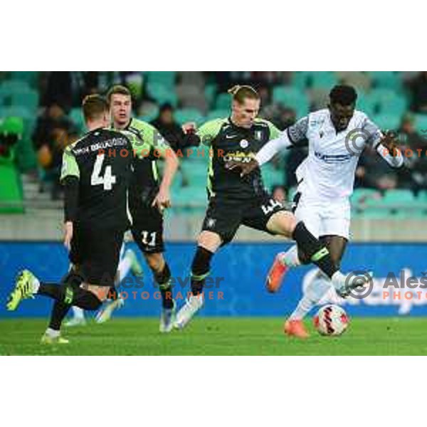 Robert Mudrazija and Anthony Parris in action during Prva Liga Telemach football match between Olimpija and Koper in SRC Stozice, Ljubljana, Slovenia on February 27, 2022