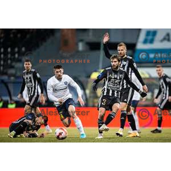 Mico Kuzmanovic vs Klemen Pucko in action during Prva liga Telemach football match between NS Mura and Celje in Fazanerija, Murska Sobota, Slovenia on March 2, 2022. Photo: Jure Banfi/www.alesfevzer.com