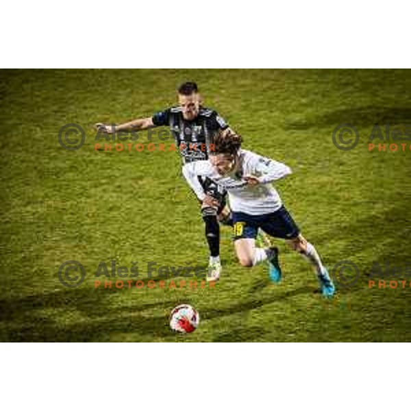 Tomi Horvat vs Tjas Begic in action during Prva liga Telemach football match between NS Mura and Celje in Fazanerija, Murska Sobota, Slovenia on March 2, 2022. Photo: Jure Banfi/www.alesfevzer.com