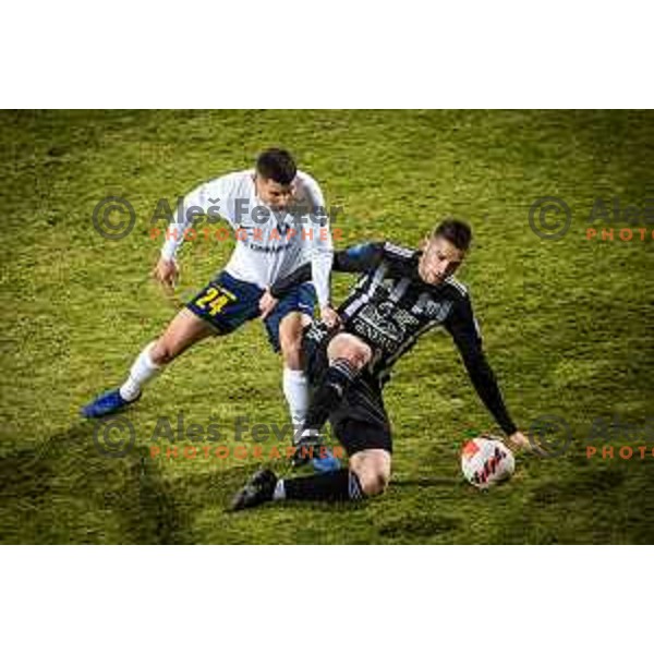 Grigory Morozov vs Amar Beganovic in action during Prva liga Telemach football match between NS Mura and Celje in Fazanerija, Murska Sobota, Slovenia on March 2, 2022. Photo: Jure Banfi/www.alesfevzer.com