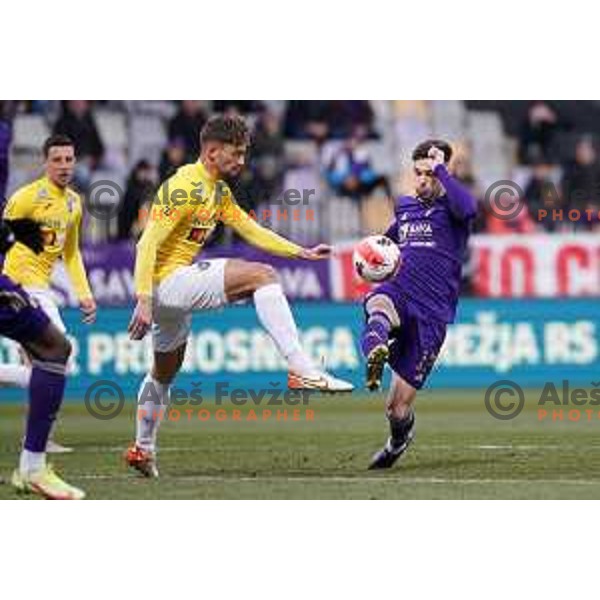 Gasper Trdin and Gregor Sikosek in action during Prva Liga Telemach 2021-2022 football match between Maribor and Bravo in Maribor , Slovenia on March 6, 2022