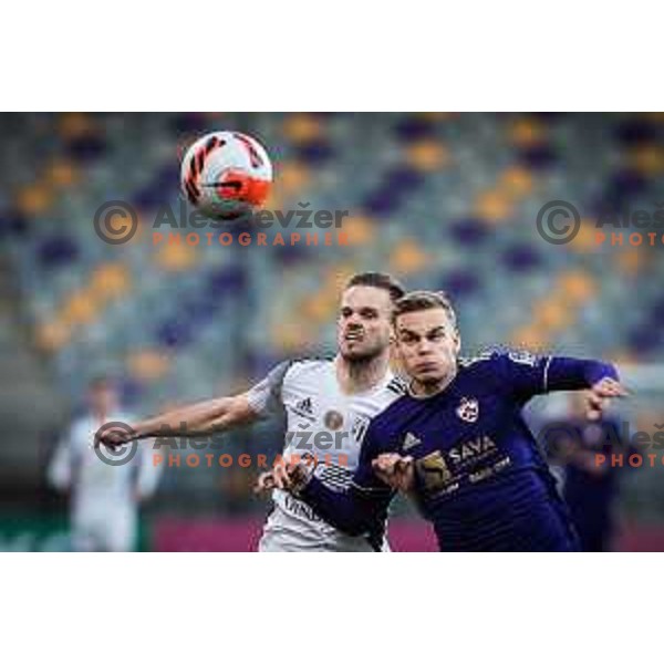 Tomi Horvat vs Aljaz Antolin in action during Prva liga Telemach football match between Maribor and NS Mura in Ljudski vrt, Maribor, Slovenia on March 13, 2022. Photo: Jure Banfi/www.alesfevzer.com