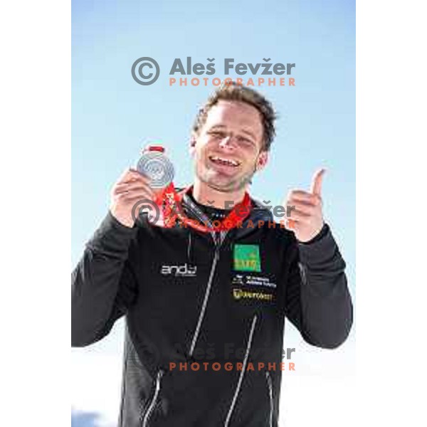 Tim Mastnak of Slovenia, Olympic Silver medalist in Snowboard Parallel Giant Slalom from Beijing 2022 Winter Olympic Games at photo shooting on March 16, 2022
