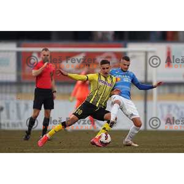Gedeon Guzina and Almin Kurtovic in action during Prva Liga Telemach 2021-2022 football match between Kalcer Radomlje and Bravo in Domzale, Slovenia on March 18, 2022 