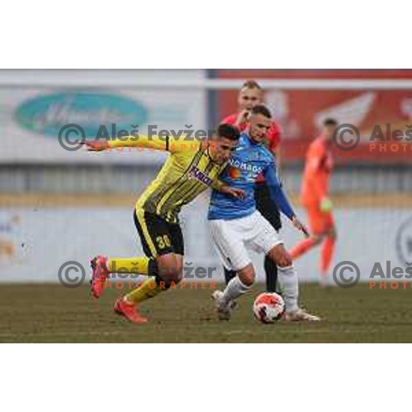 Gedeon Guzina and Almin Kurtovic in action during Prva Liga Telemach 2021-2022 football match between Kalcer Radomlje and Bravo in Domzale, Slovenia on March 18, 2022 