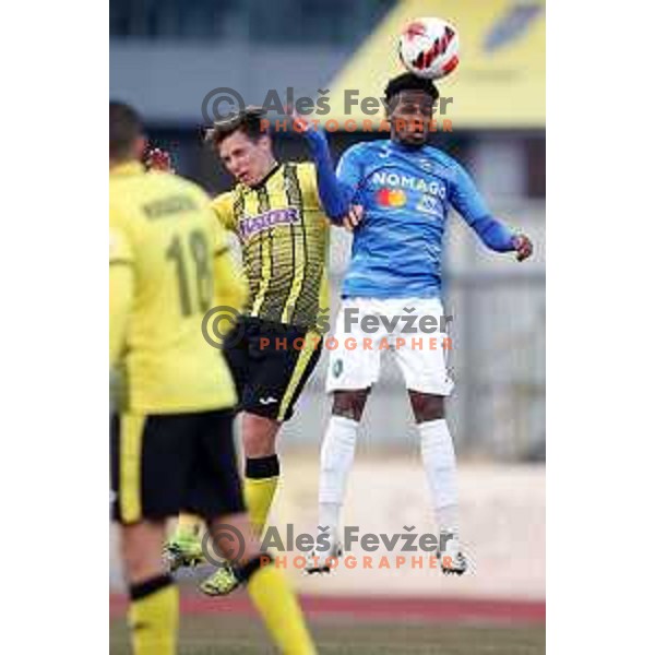 Luka Cerar and Simon Nsana in action during Prva Liga Telemach 2021-2022 football match between Kalcer Radomlje and Maribor in Domzale, Slovenia on February 21, 2022
