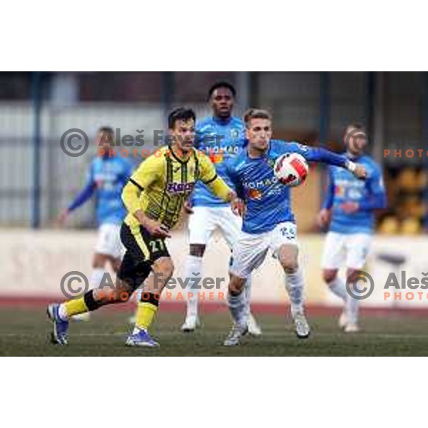 Ivan Calusic and Amar Memic in action during Prva Liga Telemach 2021-2022 football match between Kalcer Radomlje and Bravo in Domzale, Slovenia on March 18, 2022