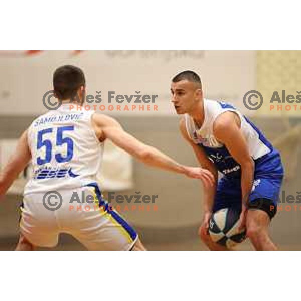 in action during Nova KBM league basketball match between ECE Triglav and Sentjur in Kranj, Slovenia on March 19, 2022