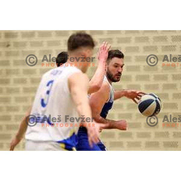 in action during Nova KBM league basketball match between ECE Triglav and Sentjur in Kranj, Slovenia on March 19, 2022