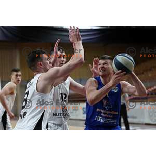 Dino Muric in action during Nova KBM league basketball match between Nutrispoint Ilirija and Sencur GGD in Tivoli Hall, Ljubljana, Slovenia on March 29, 2022 