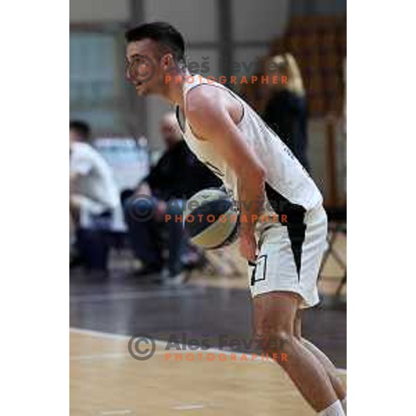 in action during Nova KBM league basketball match between Nutrispoint Ilirija and Sencur GGD in Tivoli Hall, Ljubljana, Slovenia on March 29, 2022