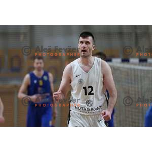 in action during Nova KBM league basketball match between Nutrispoint Ilirija and Sencur GGD in Tivoli Hall, Ljubljana, Slovenia on March 29, 2022