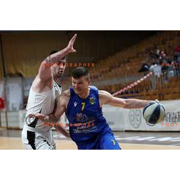 Dino Muric in action during Nova KBM league basketball match between Nutrispoint Ilirija and Sencur GGD in Tivoli Hall, Ljubljana, Slovenia on March 29, 2022 