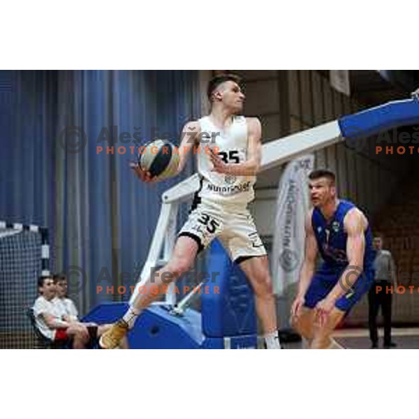 in action during Nova KBM league basketball match between Nutrispoint Ilirija and Sencur GGD in Tivoli Hall, Ljubljana, Slovenia on March 29, 2022