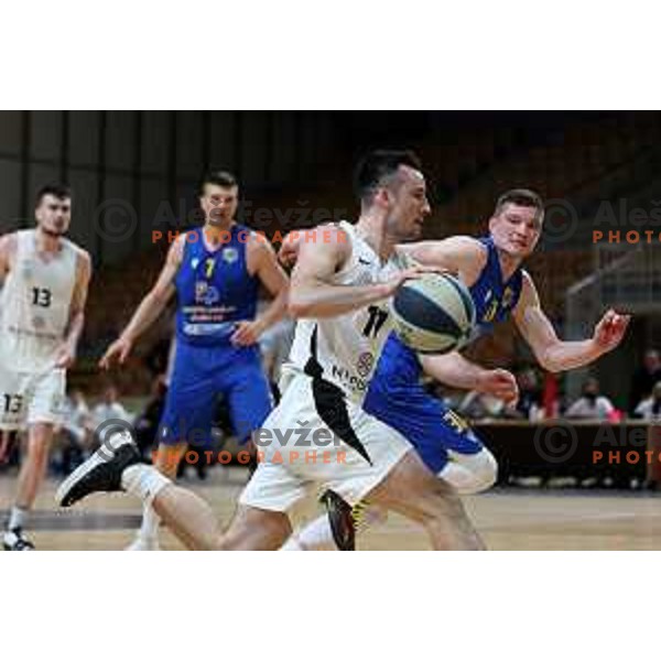 in action during Nova KBM league basketball match between Nutrispoint Ilirija and Sencur GGD in Tivoli Hall, Ljubljana, Slovenia on March 29, 2022