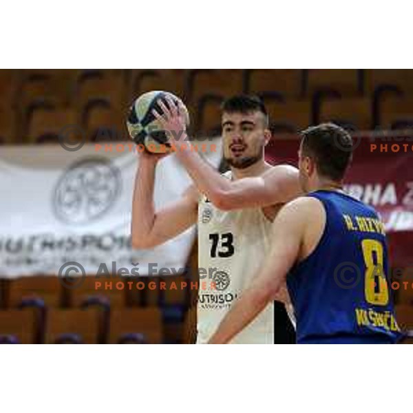 in action during Nova KBM league basketball match between Nutrispoint Ilirija and Sencur GGD in Tivoli Hall, Ljubljana, Slovenia on March 29, 2022