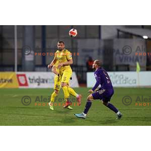 Janez Pisek and Ognjen Mudrinski in action during Prva Liga Telemach 2021-2022 football match between Domzale and Maribor in Domzale Sports Park, Slovenia on April 2, 2022