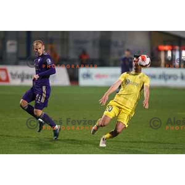 Ognjen Mudrinski and Sven Karic in action during Prva Liga Telemach 2021-2022 football match between Domzale and Maribor in Domzale Sports Park, Slovenia on April 2, 2022