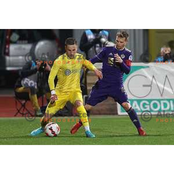 Enes Alic and Martin Milec in action during Prva Liga Telemach 2021-2022 football match between Domzale and Maribor in Domzale Sports Park, Slovenia on April 2, 2022