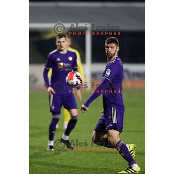 Rok Kronaveter in action during Prva Liga Telemach 2021-2022 football match between Domzale and Maribor in Domzale Sports Park, Slovenia on April 2, 2022