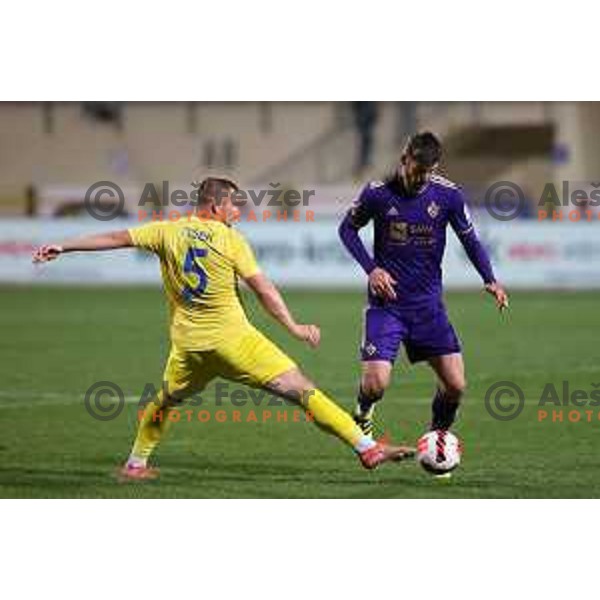 Janez Pisek and Rok Kronaveter in action during Prva Liga Telemach 2021-2022 football match between Domzale and Maribor in Domzale Sports Park, Slovenia on April 2, 2022