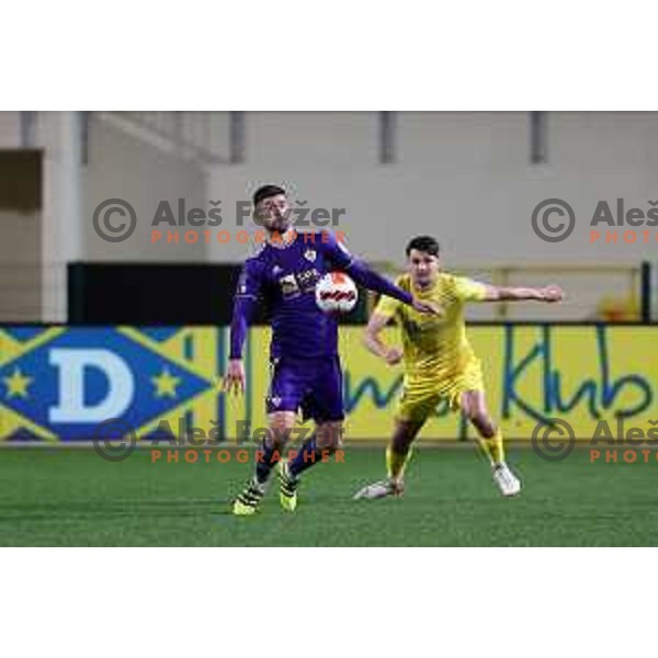 Rok Kronaveter in action during Prva Liga Telemach 2021-2022 football match between Domzale and Maribor in Domzale Sports Park, Slovenia on April 2, 2022
