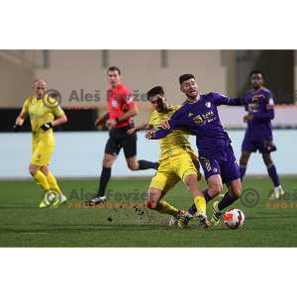 Sven Karic and Rok Kronaveter in action during Prva Liga Telemach 2021-2022 football match between Domzale and Maribor in Domzale Sports Park, Slovenia on April 2, 2022