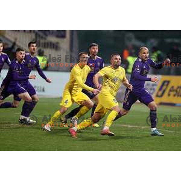 Janez Pisek and Ognjen Mudrinski in action during Prva Liga Telemach 2021-2022 football match between Domzale and Maribor in Domzale Sports Park, Slovenia on April 2, 2022