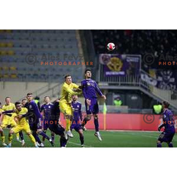 Gaber Dobrovoljc and Nemanja Mitrovic in action during Prva Liga Telemach 2021-2022 football match between Domzale and Maribor in Domzale Sports Park, Slovenia on April 2, 2022