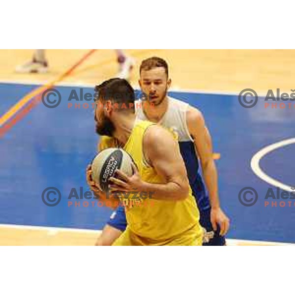 Jan Rizman and Patrik Tabak in action during Nova KBM league basketball match between Hopsi and Sentjur in Polzela, Slovenia on April 2, 2022