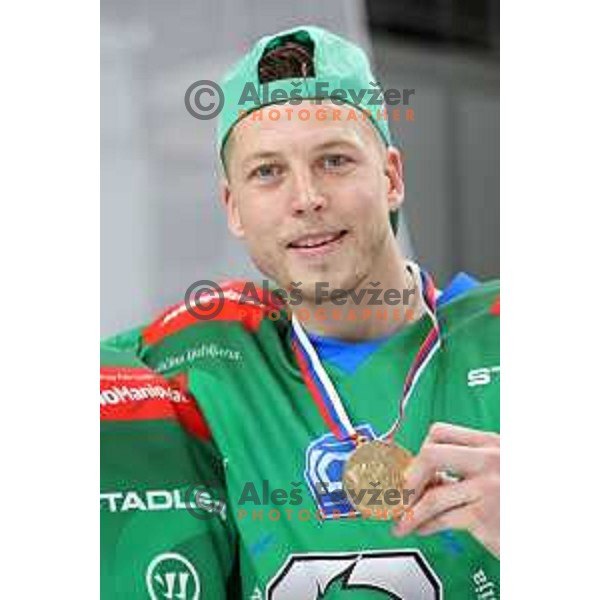 Tadej Cimzar of SZ Olimpija celebrates Slovenian National ice-hockey title in Ljubljana, Slovenia on April 5, 2022