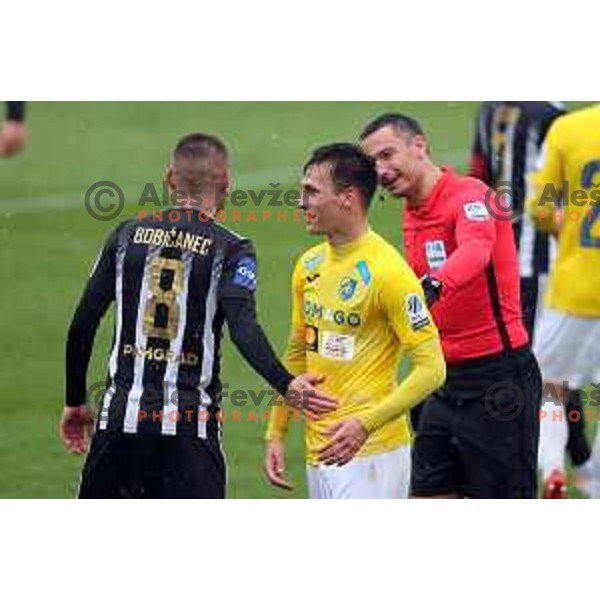 Referee Slavko Vincic and Luka Kerin during Prva Liga Telemach football match between Bravo and Mura in Ljubljana, Slovenia on April 9, 2022